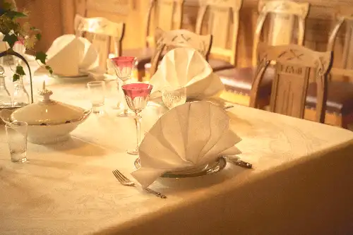 photo containing: Furniture, Tablecloth, Table, Tableware, Textile, Stemware, Dishware, Serveware, Linens, Cutlery
