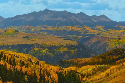 photo containing: Mountain, Mountainous landforms, Yellow, Natural landscape, Hill, Highland, Mountain range, Wilderness, Landscape, Ecoregion