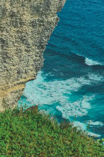 photo containing: Blue, Body of water, Coast, Rock, Sea, Coastal and oceanic landforms, Ocean, Terrain, Geological formation, Geology