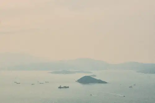 photo containing: Water resources, Water, atmospheric phenomenon, Horizon, Coastal and oceanic landforms, Sea, Liquid, Ocean, Watercraft, Mist