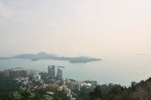 photo containing: Sky, Horizon, atmospheric phenomenon, Sea, Landscape, Coast, High-rise building, Coastal and oceanic landforms, Ocean, Skyscraper