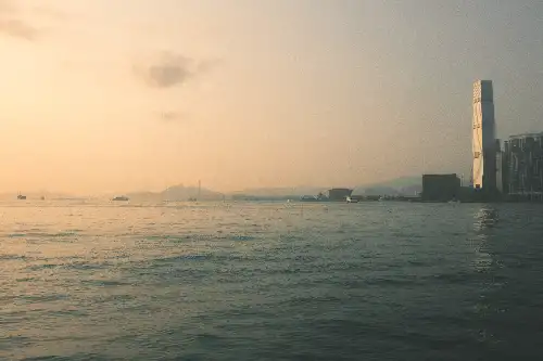 photo containing: Sky, Water, Daytime, Body of water, Skyscraper, City, High-rise building, Horizon, atmospheric phenomenon, Waterway