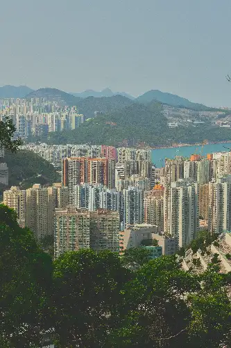 photo containing: City, Skyscraper, Building, Urban area, Daytime, Metropolitan area, High-rise building, Cityscape, Apartment, Residential area