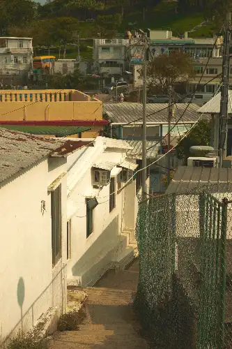 photo containing: Wall, Neighbourhood, Residential area, Electricity, Slope, Suburb, Wire, Village, Alley, Electrical Supply