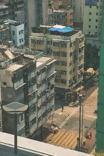 photo containing: Daytime, Building, Urban area, City, Apartment, Metropolitan area, High-rise building, Architecture, Neighbourhood, Residential area
