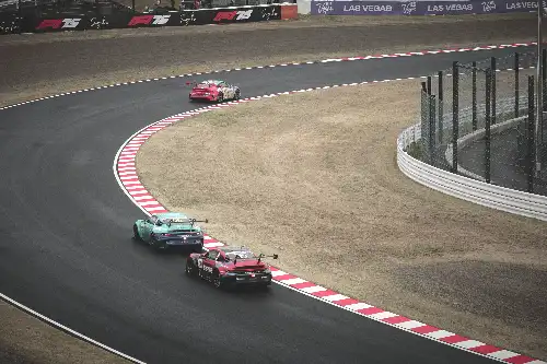 photo containing: Sports venue, Car, Race track, Motorsport, Auto racing, Racing, Race car, Sports car racing, Asphalt, Endurance racing