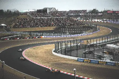 photo containing: Sports venue, Race track, Motorsport, Auto racing, Race car, Racing, Sports car racing, Fence, Tar, Formula 1