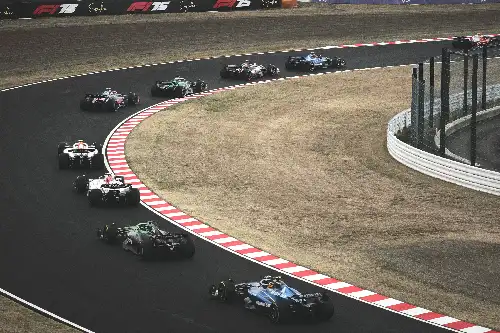 photo containing: Sports venue, Automotive Tire, Racing, Open-wheel car, Formula 1, Formula One tyres, Auto racing, Car, Race car, Motorsport