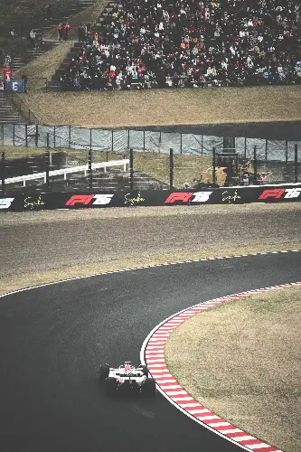 photo containing: Automotive Tire, Formula One tyres, Race car, Race track, Formula 1, Open-wheel car, Auto racing, Motorsport, Sports venue, Formula One car