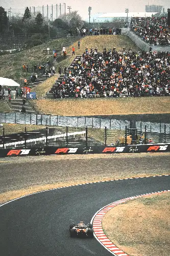 photo containing: Sports venue, Race track, Race car, Formula One tyres, Formula 1, Auto racing, Motorsport, Racing, Open-wheel car, Formula racing