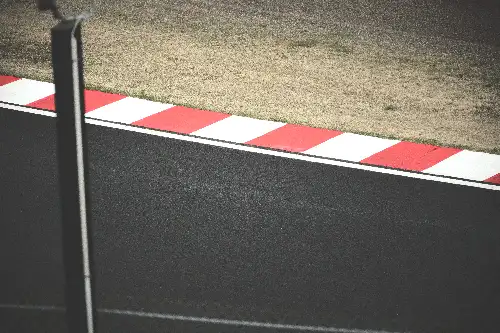 photo containing: Asphalt, Composite material, Race track, Tar, Concrete, Shadow