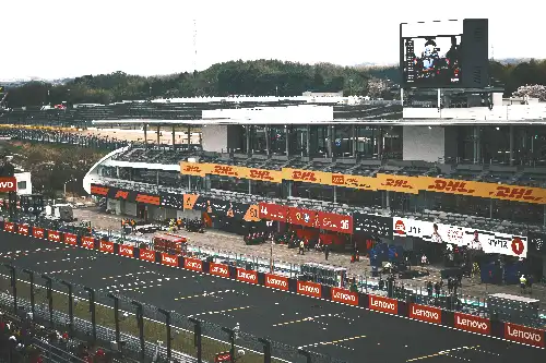 photo containing: Sports venue, Race track, Stadium, Sports car racing, Race car, Racing, Motorsport, Auto racing, Performance car, Sports car