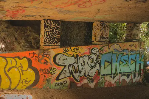 photo containing: Wall, Mural, Graffiti, Orange, Brown, Art, Visual arts, Street art, Art Paint, Paint